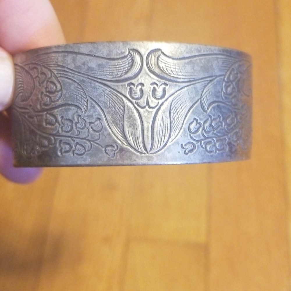 Pewter bracelet with may inscribed inside